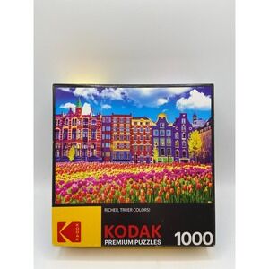 Traditional Old Buildings and Tulips in Amsterdam, Netherlands 1000 Piece Puzzle